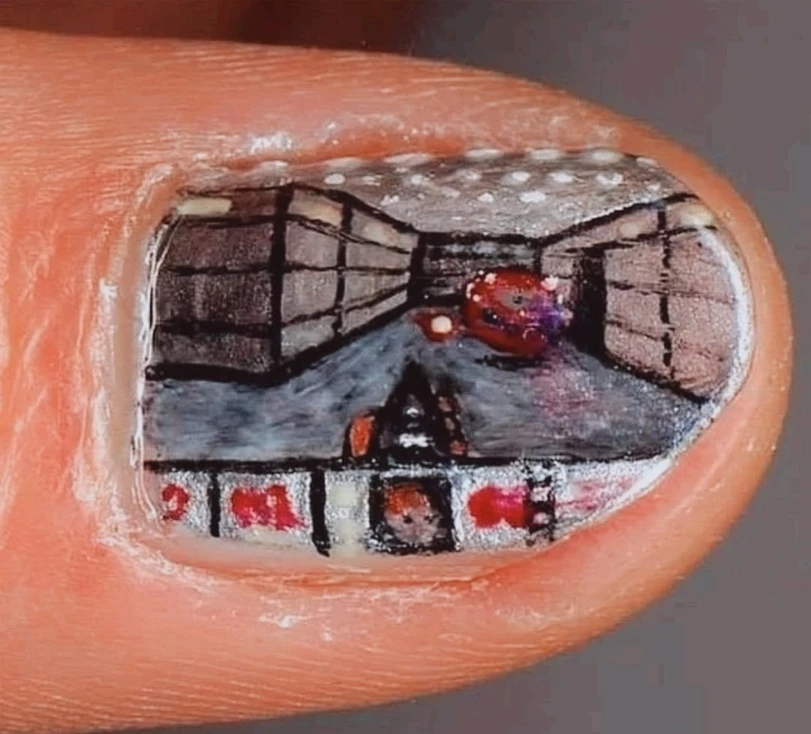 Doom уже даже на ногтях запустили...